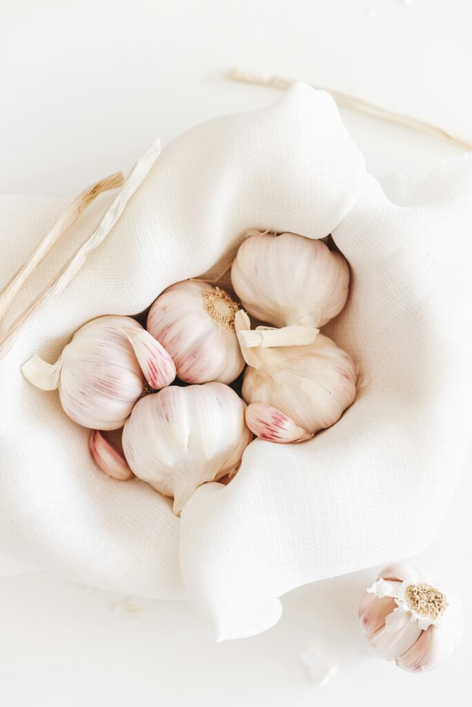 Fresh garlic cloves ready to be used in fermented honey